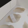 Our 12 cavity cupcake box with our E005B white cupcake cases